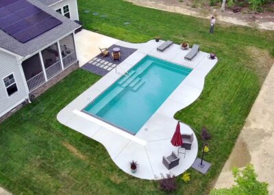 This job included a Marvelous 30′ inground pool construction adjacent to a concrete deck tying into a patio. Ashland, VA.