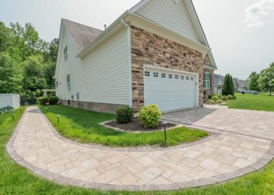 This project included the installation of a Cambridge Ledgestone paver driveway with matching walkway around the house. Glen Allen, VA