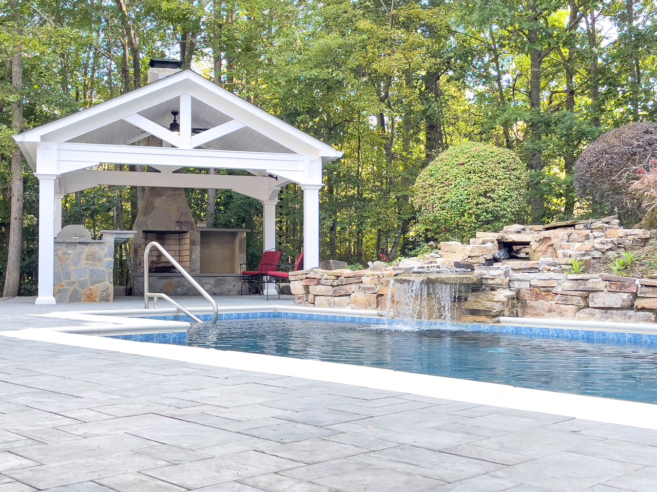 Pool, pavilion and outdoor kitchen with paver patio | Richmond, VA | Cleanstone Construction | winter maintenance