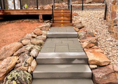 Custom Deck Build with Cumaru Brazilian cherry composite decking, stainless steel cable railing, and a custom lighting package | dillwiyn, va | cleanstone construction