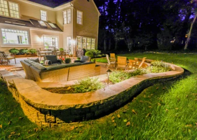 custom outdoor patio with outdoor lighting and furniture.