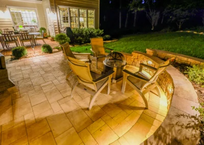 custom outdoor patio with outdoor lighting and furniture.