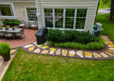 custom outdoor patio with outdoor lighting and furniture.