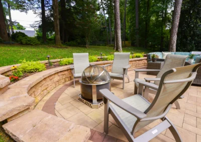 custom outdoor patio with outdoor lighting and furniture.