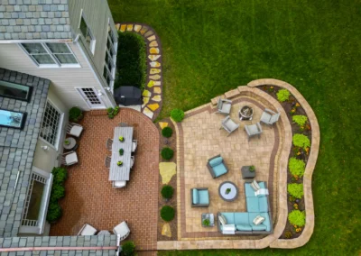 custom outdoor patio with outdoor lighting and furniture.