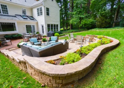 custom outdoor patio with outdoor lighting and furniture.