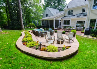 custom outdoor patio with outdoor lighting and furniture.
