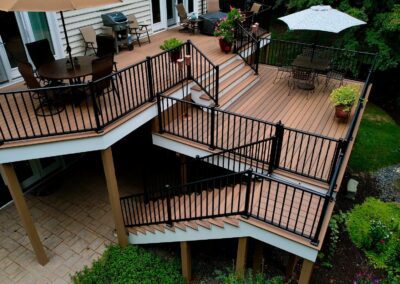 Triple tiered Deck attached to back of house.